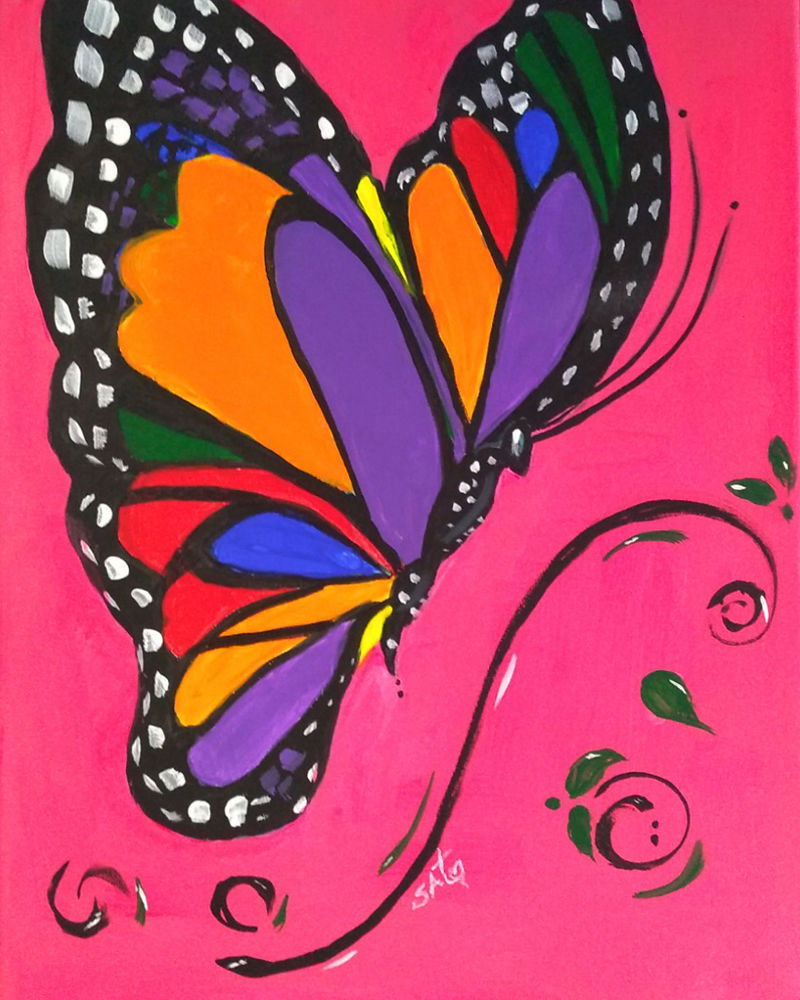 rainbow butterfly on pink background
