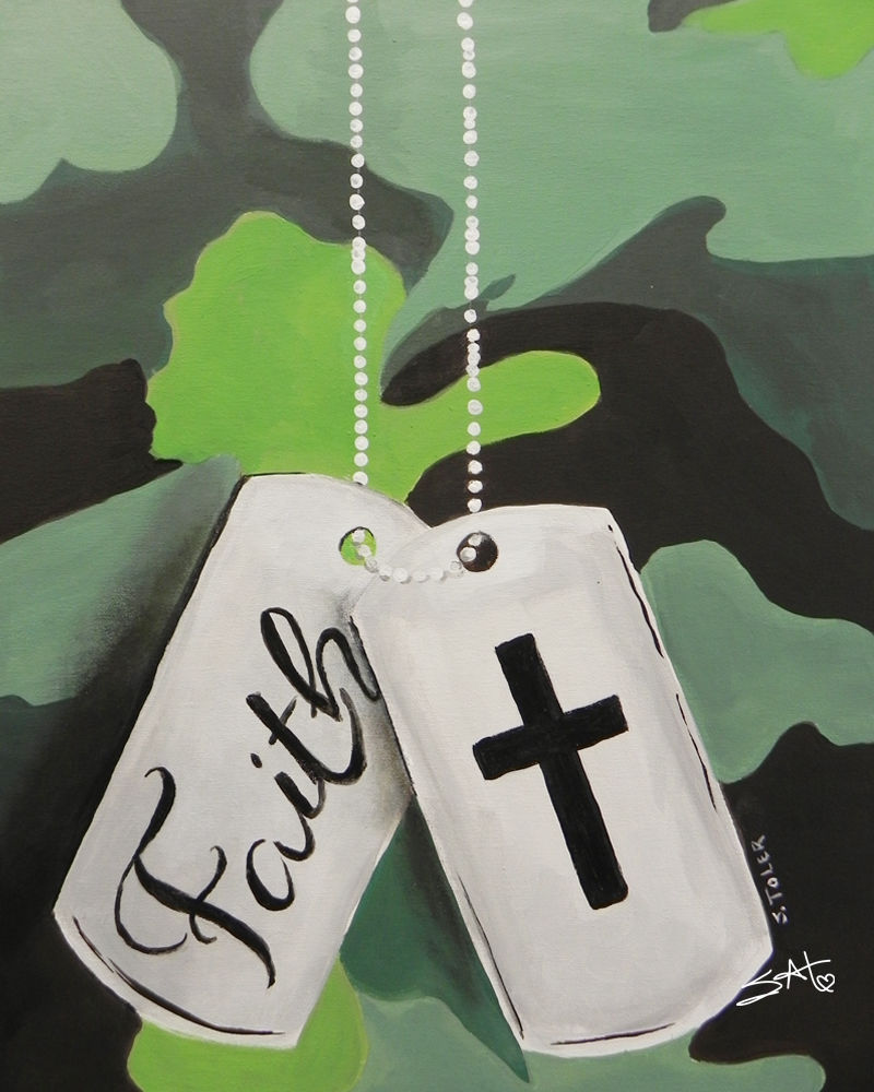 tags with the word faith and a cross image drapped across green camouflage