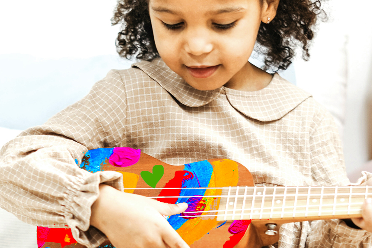 girl playing ukulele