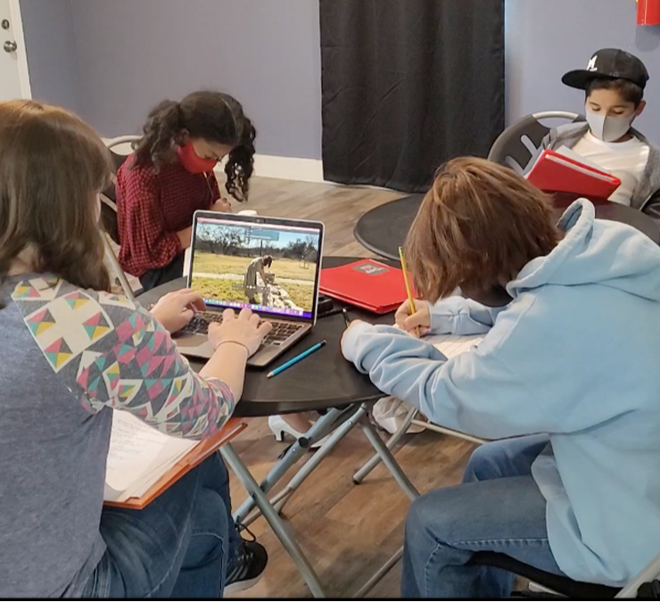 students editing film